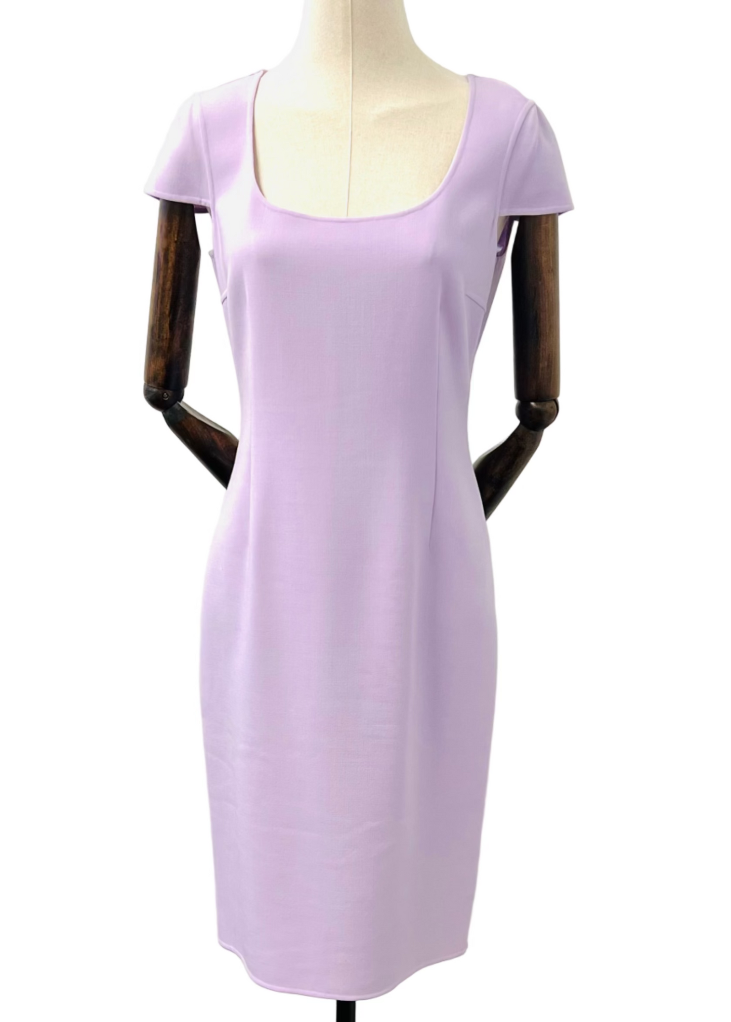 A purple wool cap sleeve sheath dress with a back slit, displayed on a mannequin.