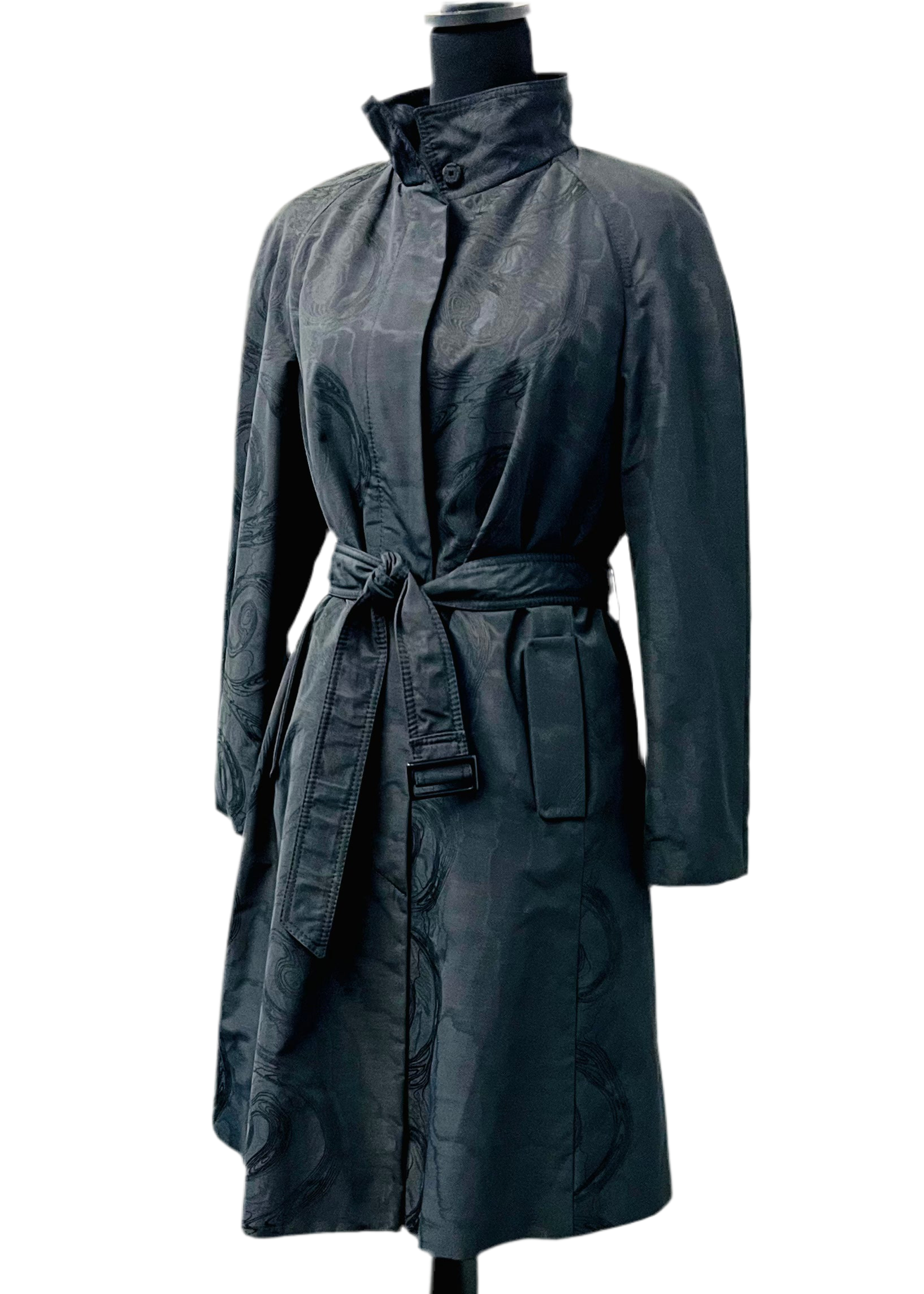Dark gray trench coat on a mannequin against a white background